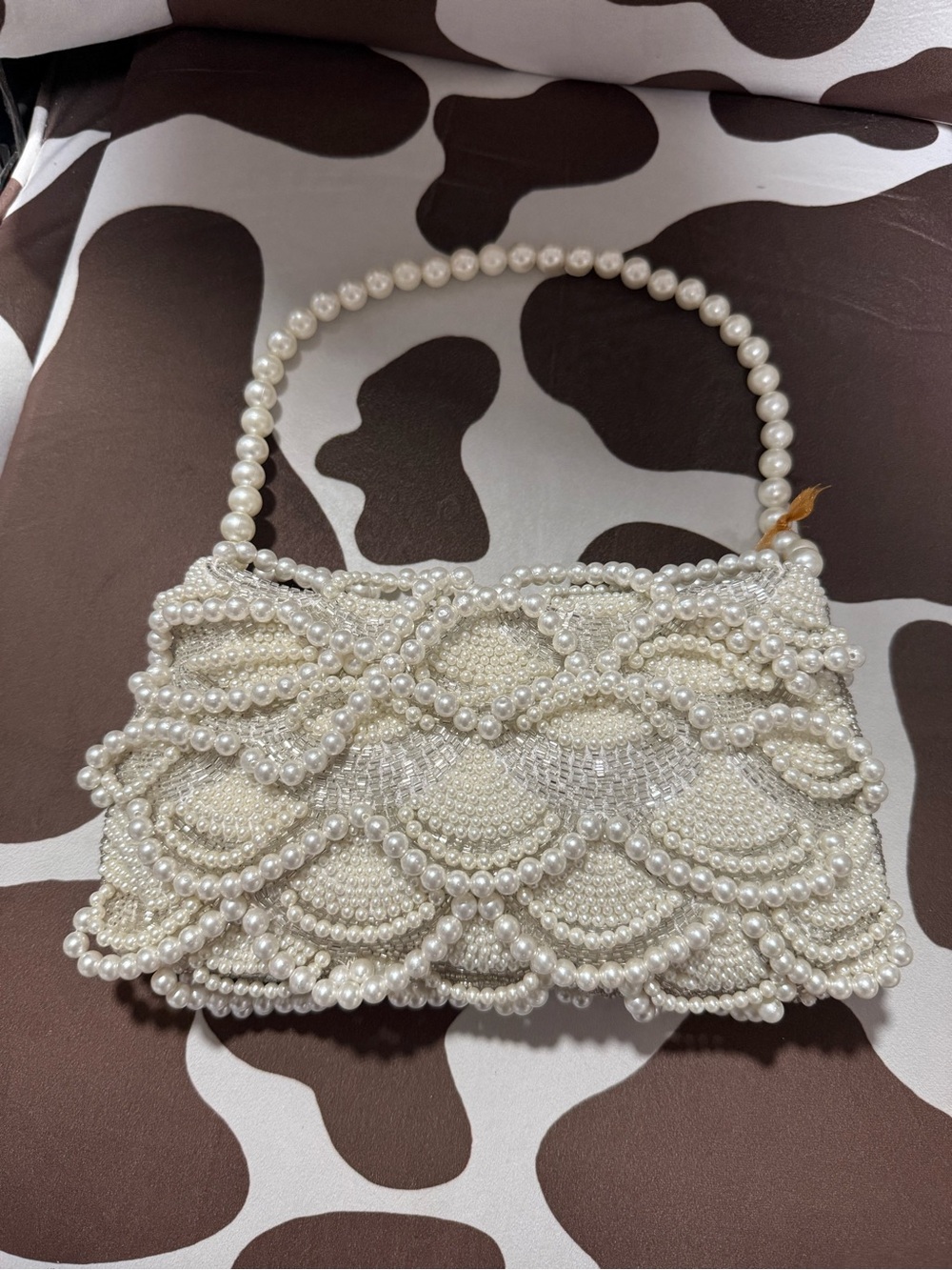 Elegant beaded pearl bag
